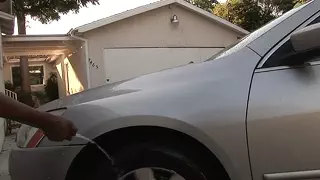 Big tits washing the car